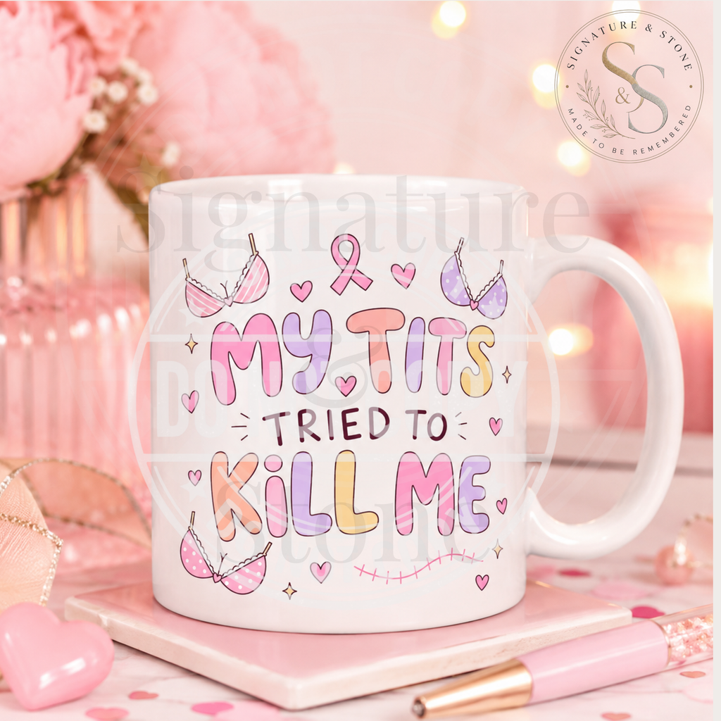 My Tits Tried to Kill Me breast cancer survivor ceramic mug with pink themed styling.